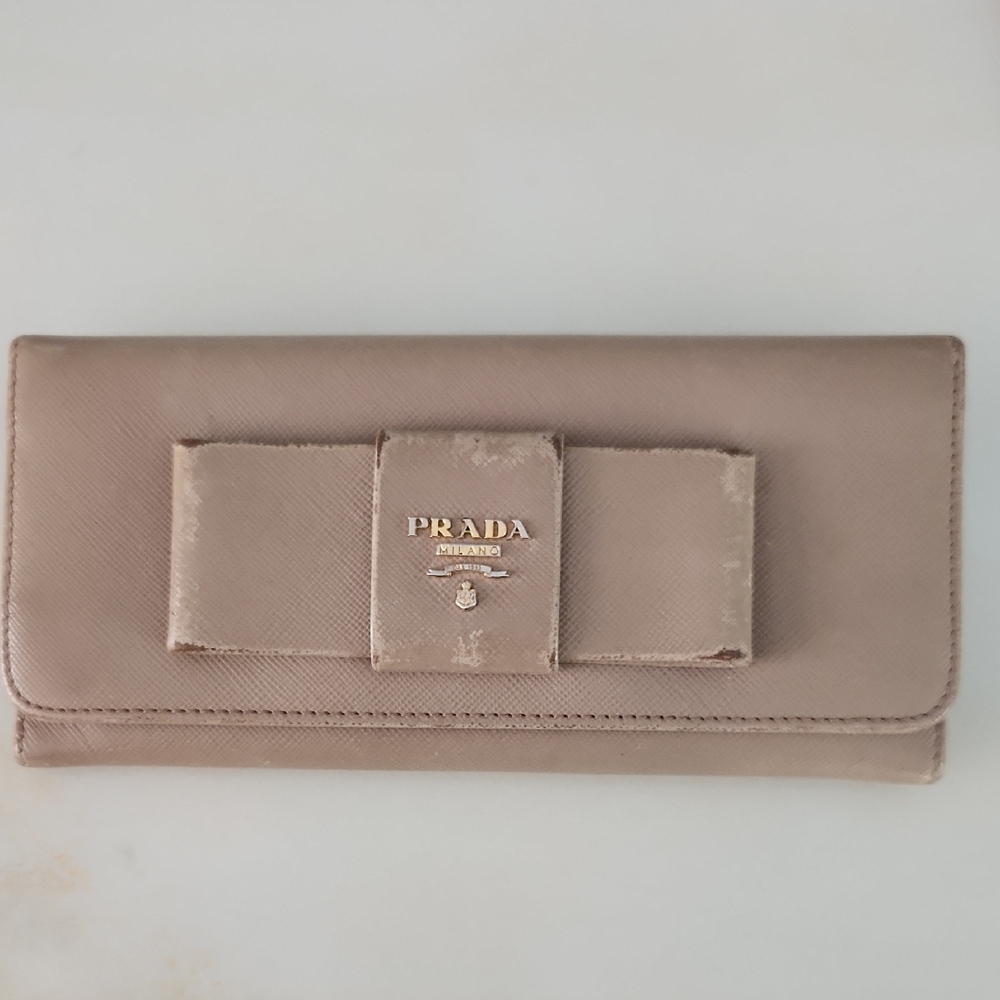 Prada Women's Beige Wallet with Bow Accent..Paint It To Give It A New Look!